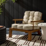 Wide-Leg Teak Outdoor Chair with Slatted Frame and Tufted Cushion
